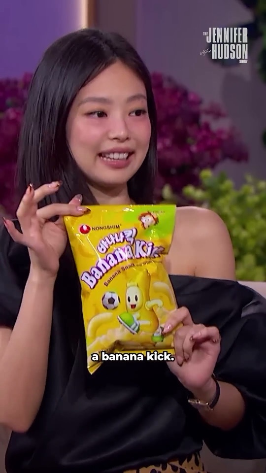 Jennie of BLACKPINK holding a bag of Nongshim Banana Kick on The Jennifer Hudson Show